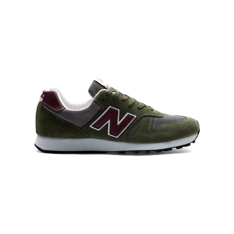 Zielone buty sportowe New Balance sznurowane w sportowym stylu