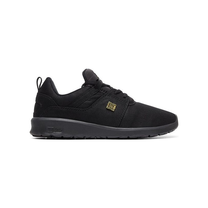 Czarne buty sportowe DC Shoes z płaską podeszwą w młodzieżowym stylu