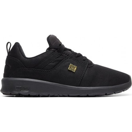 Czarne buty sportowe DC Shoes z płaską podeszwą w młodzieżowym stylu